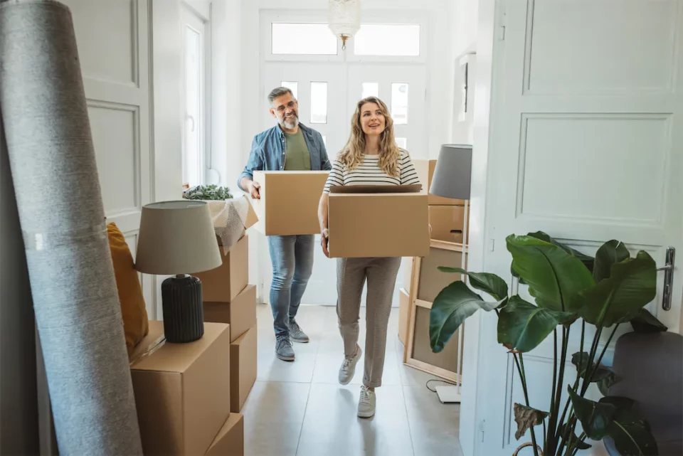 A couple moving into their new home