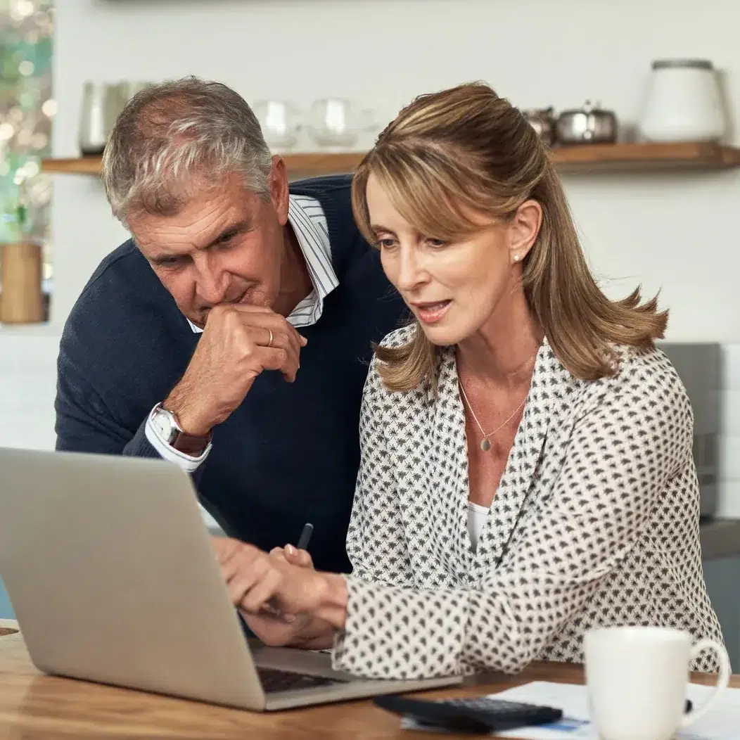 Older Couple Looking at Computer