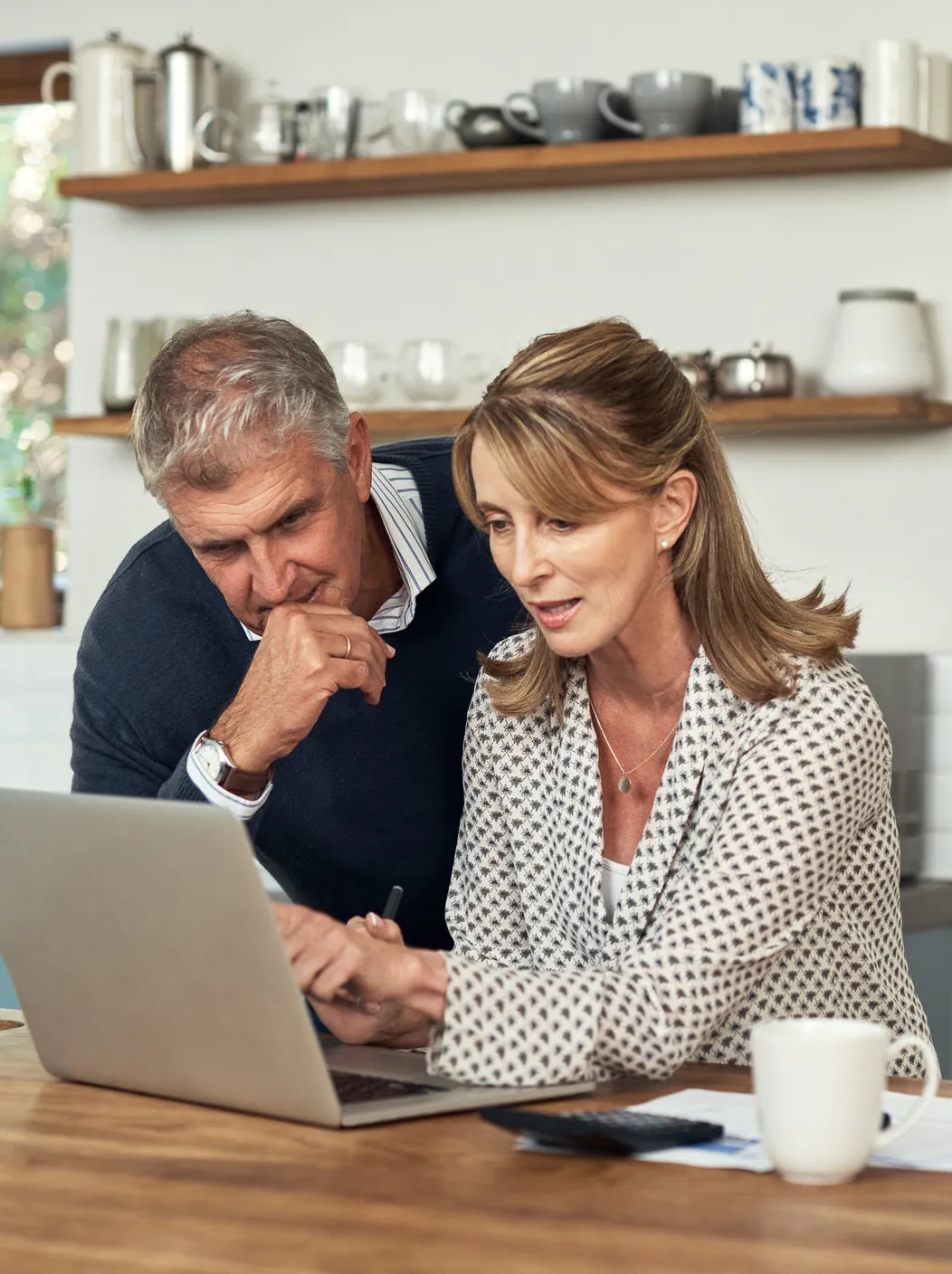 Older Couple Looking at Computer